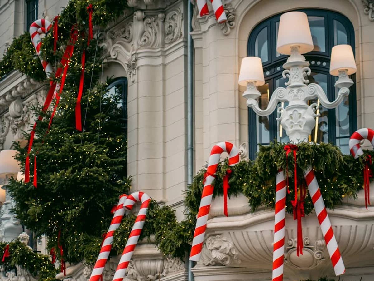 Bucharest elegantly decorated neoclassical building facade at Christmas