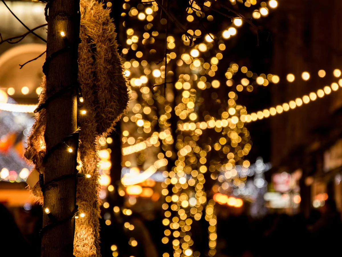 Timisoara close-up of golden bokeh lights and festive decorations during winter