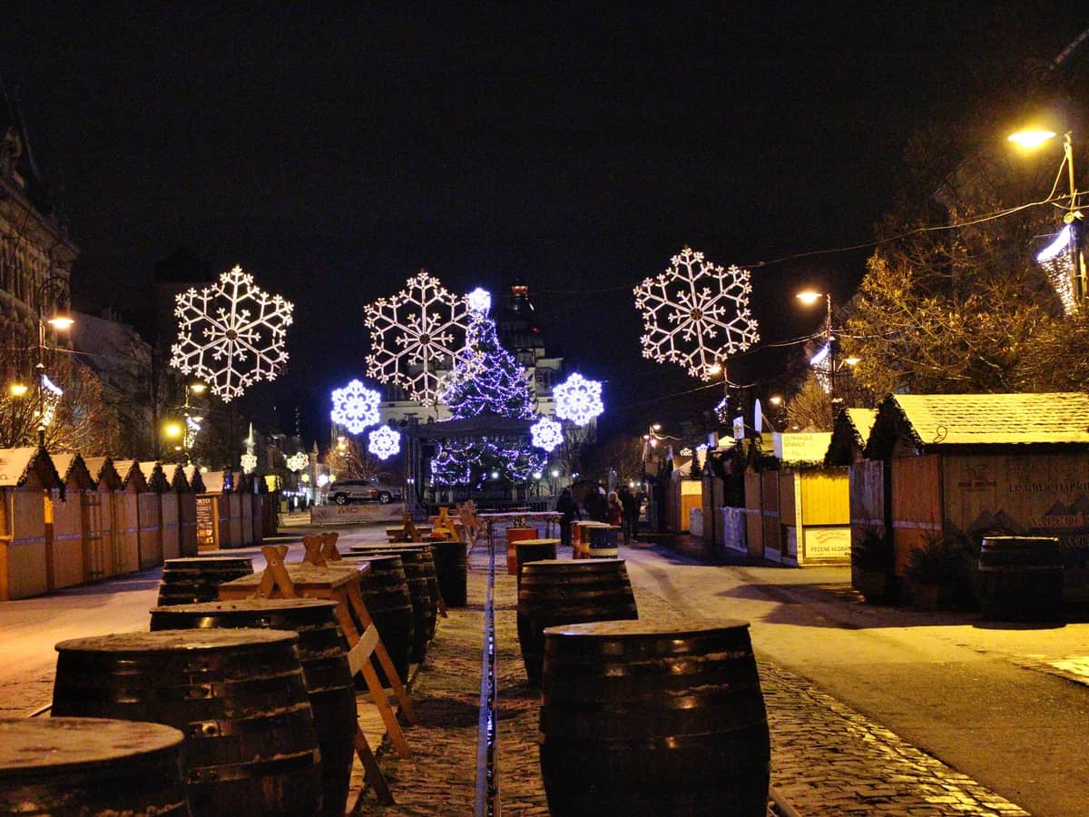 Košice glowing snowflake decorations in a magical blue-hour winter market