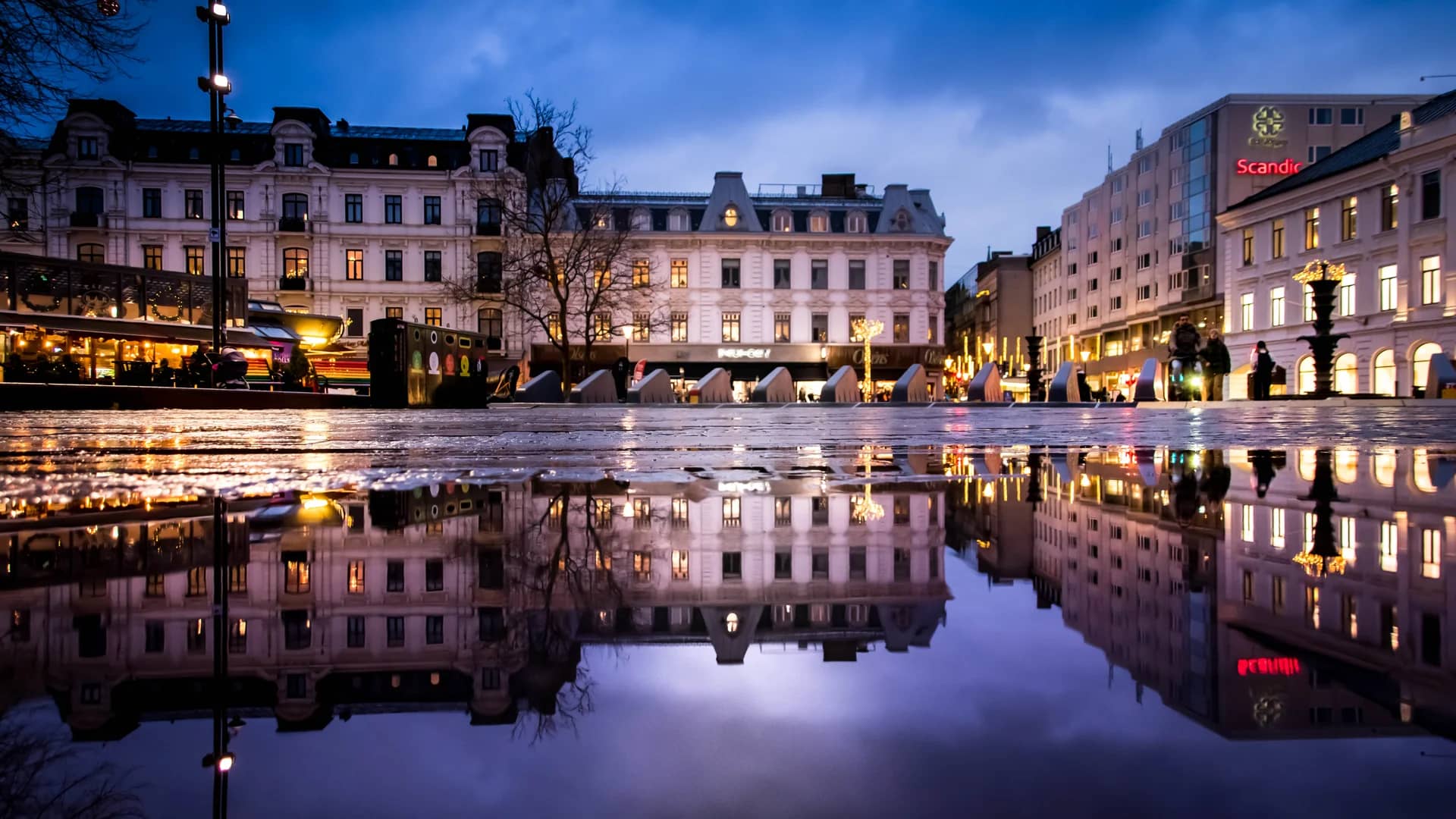 Malmö Town Hall illuminated at blue hour during winter festivities