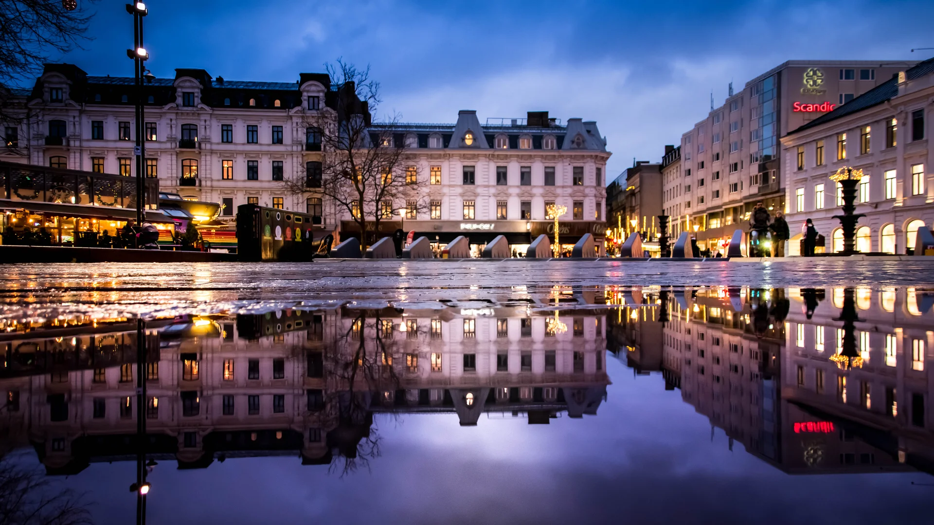 Malmö Town Hall illuminated at blue hour during winter festivities