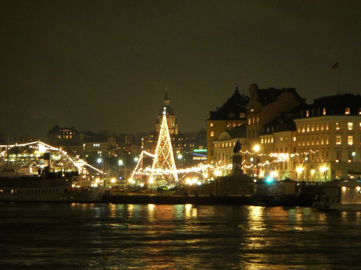 Stockholm's Gamla Stan illuminated Christmas tree during winter