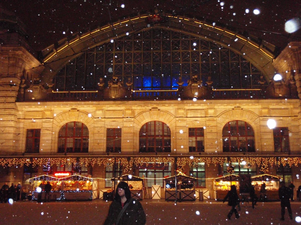 Basel SBB train station adorned with festive lights in a winter wonderland