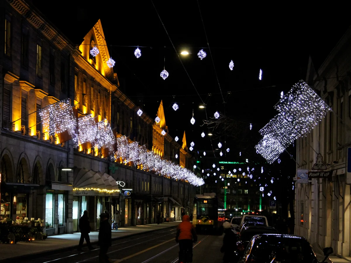 Geneva illuminated by Christmas lights in a magical winter evening