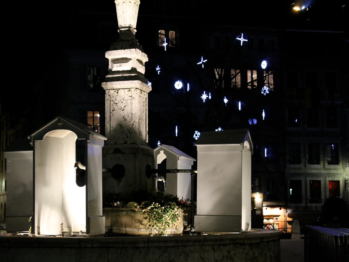 Geneva Old Town square with festive Christmas decorations at blue hour