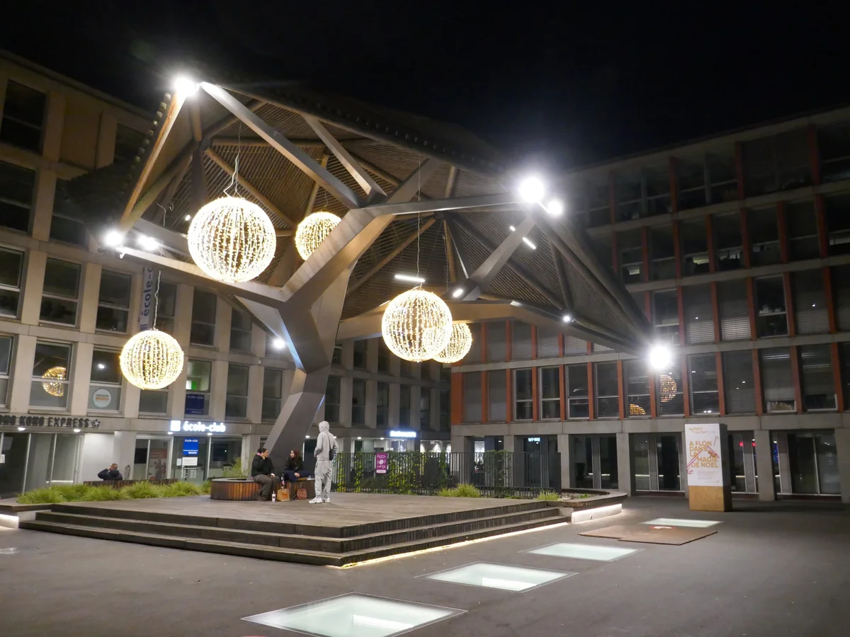 Lausanne Flon district geometric architecture adorned with golden Christmas spheres