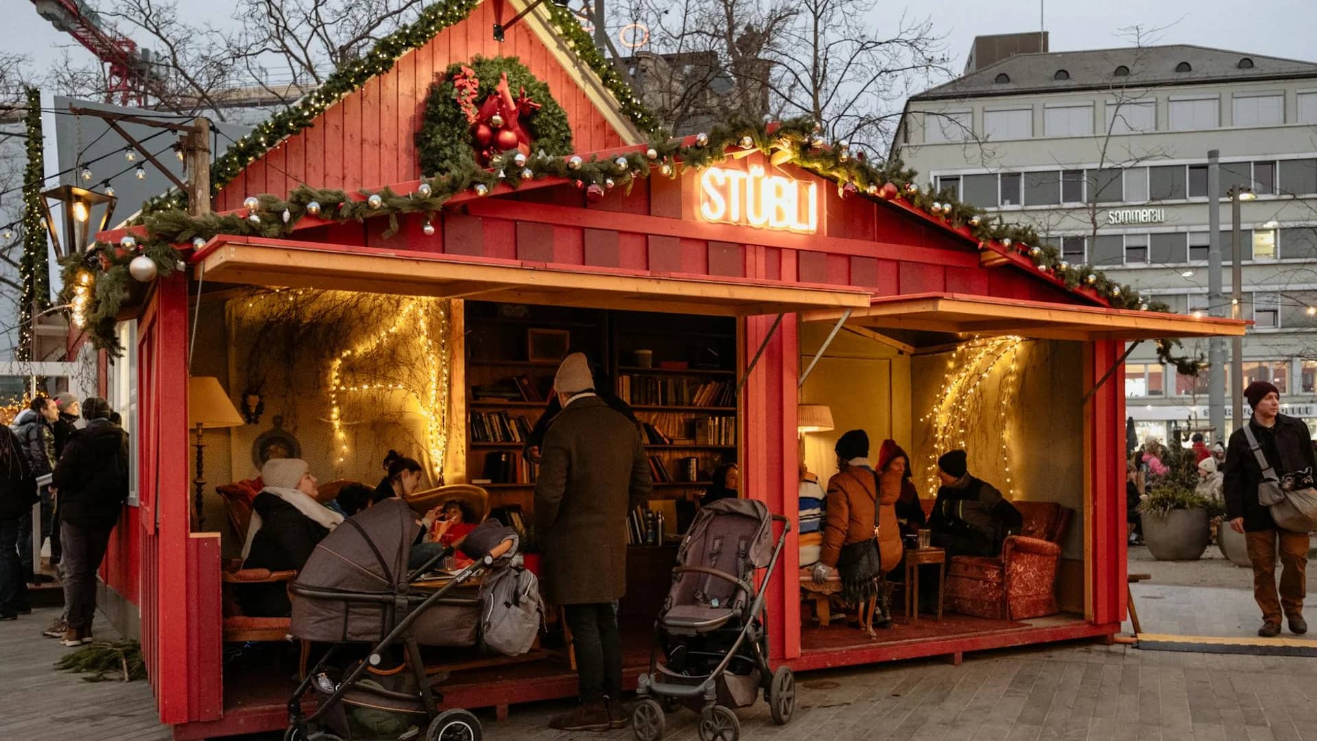 Zurich cozy red market hut adorned with festive Christmas decorations