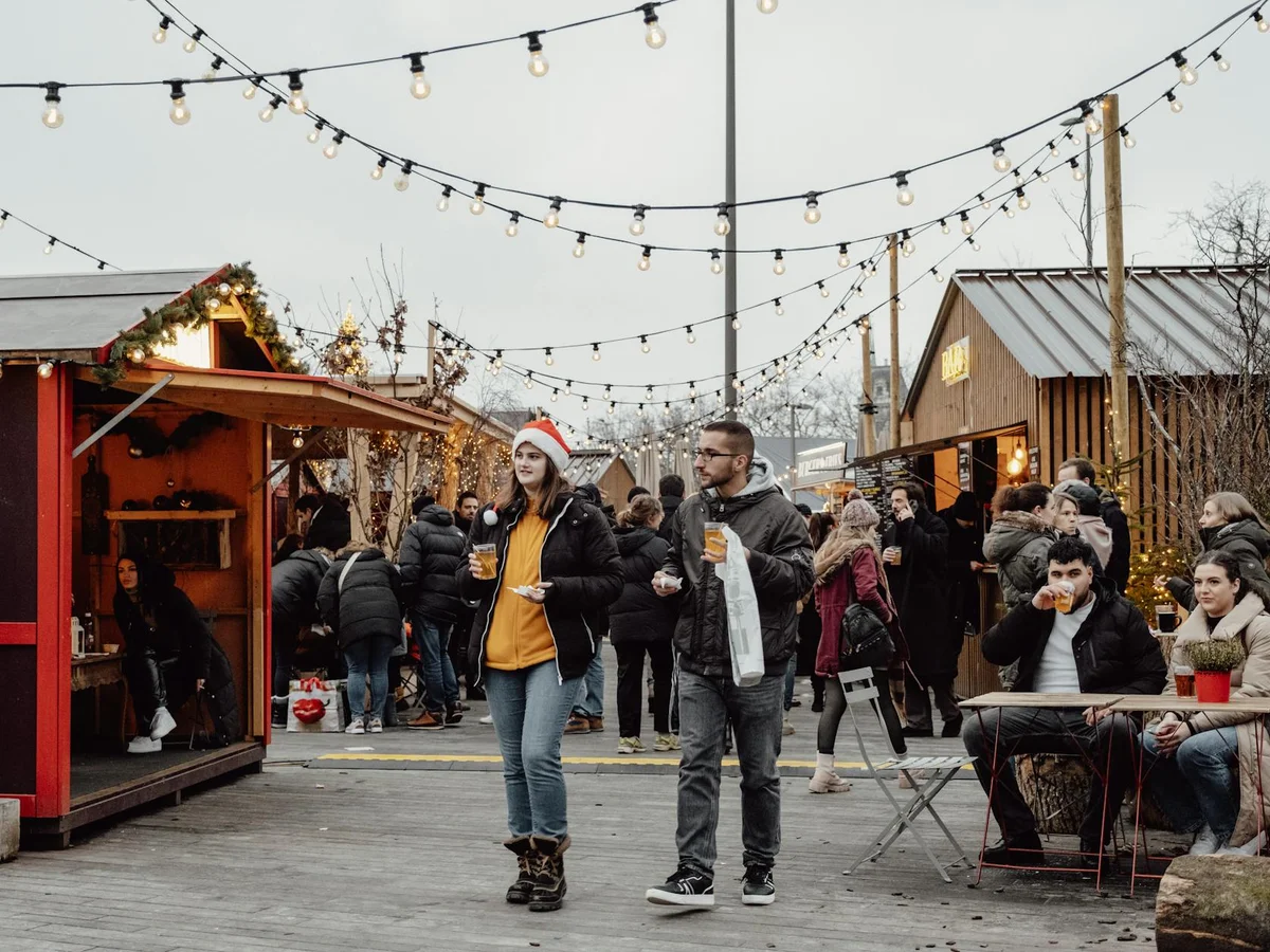 Zurich festive market scene showcasing warm lights in winter atmosphere