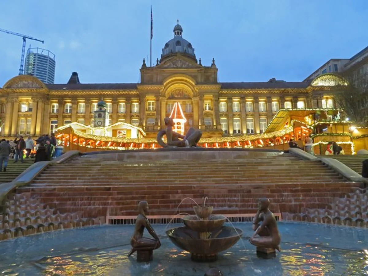 Birmingham Council House illuminated during winter Christmas market