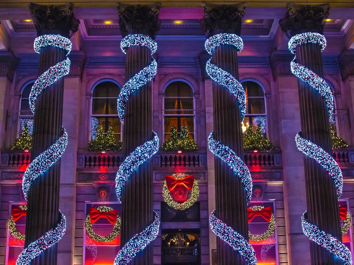 Edinburgh neoclassical architecture adorned with festive blue lights in winter