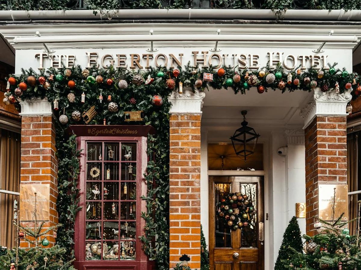 London luxury hotel entrance adorned for Christmas winter festivities