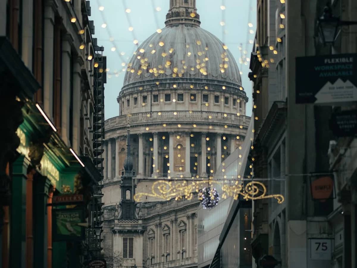 London St Paul's Cathedral framed by festive lights in winter