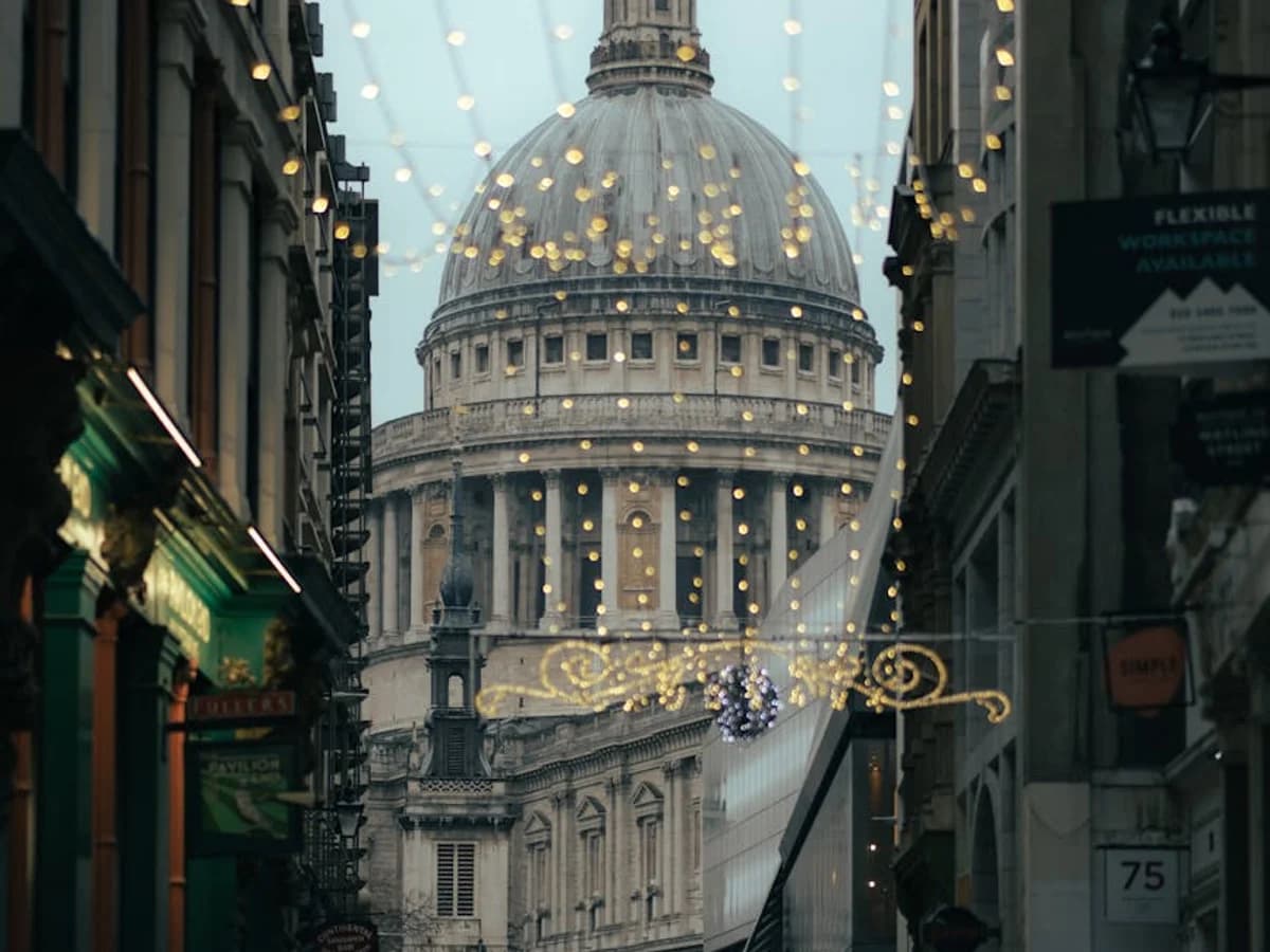 London St Paul's Cathedral framed by festive lights in winter