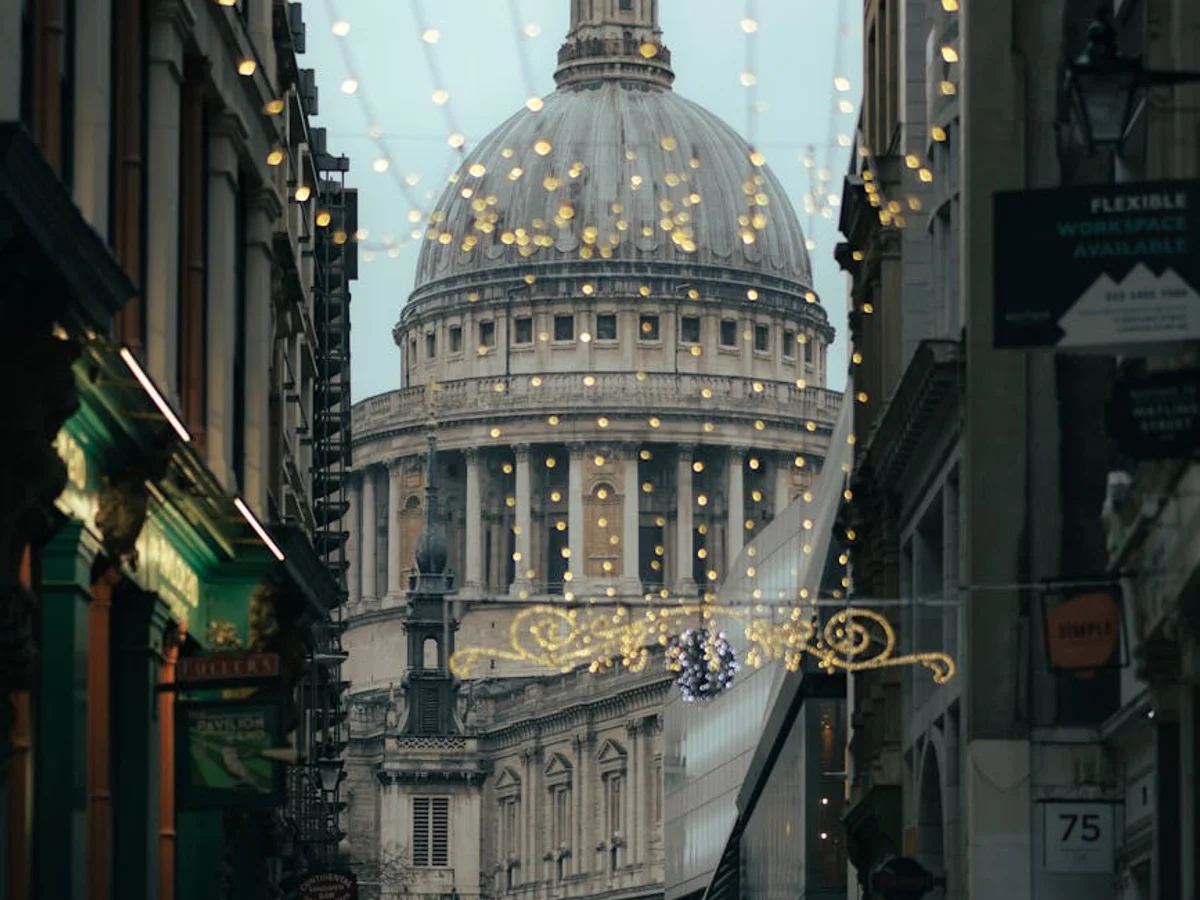 London St Paul's Cathedral framed by festive lights in winter